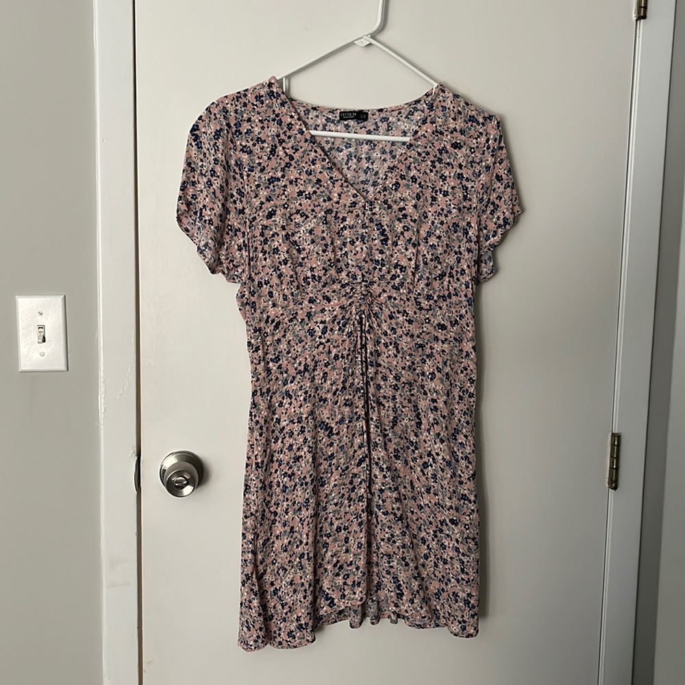 Very cute short dress goes well with heels, sandals or sneakers